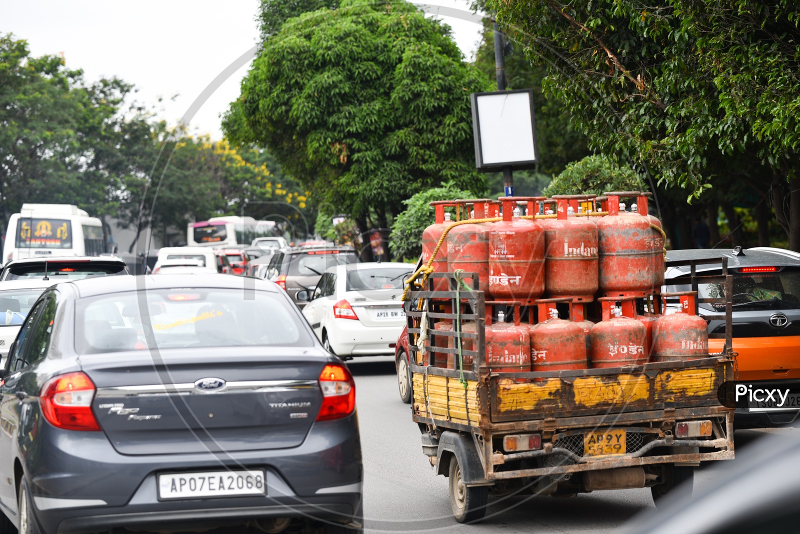 Indane Cylinder Carrying Truck In City Roads