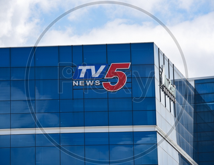 TV5 News Name on Building Facade