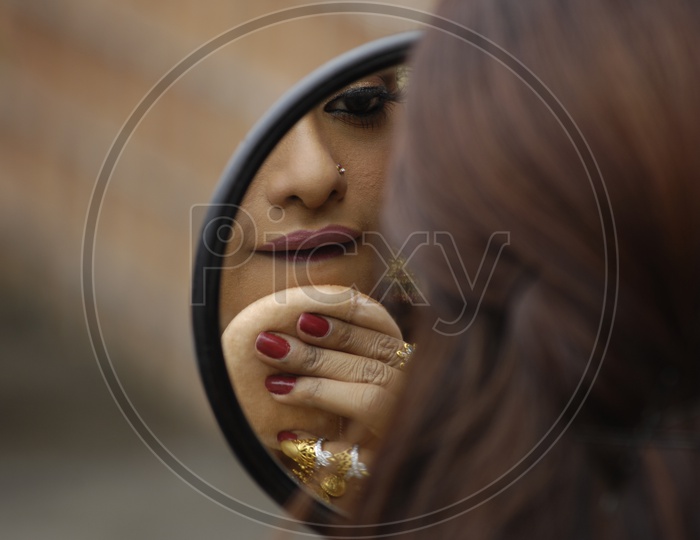 Indian Woman wearing makeup