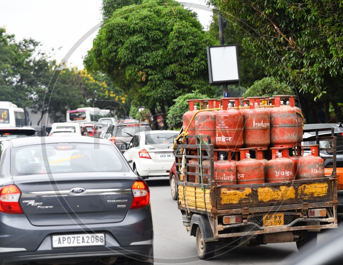 Indane Cylinder Carrying Truck In City Roads