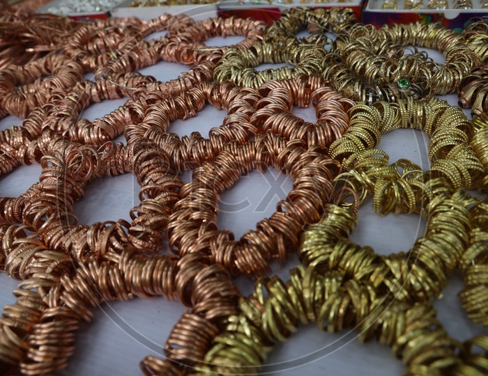Copper and Gold Coated Finger Rings at a vendor Stall