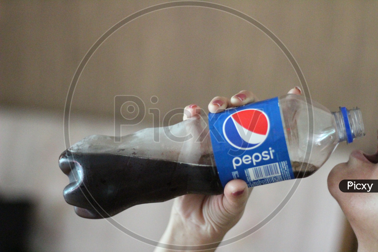 Drinking Pepsi Cool Drink or Soft Drink