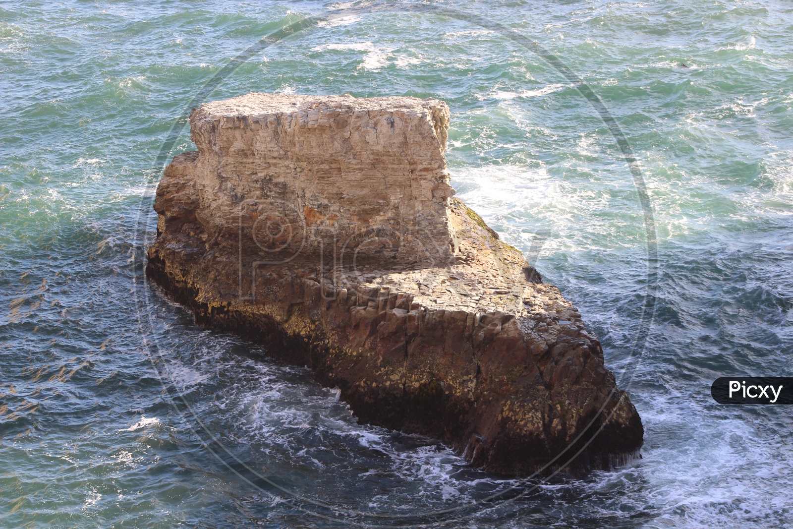 A Massive outcrop rock in the sea
