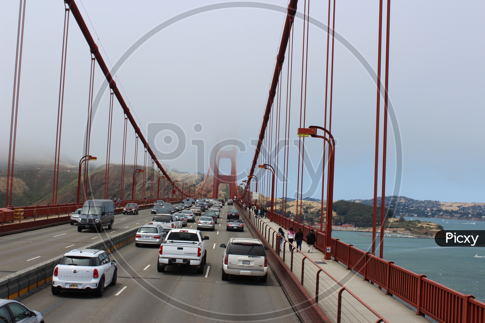moving vehicles on Golden Gate Bridge.