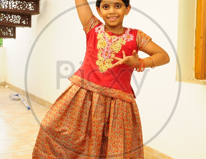 Portrait Of Cute Little Girl Posing In Beautiful Dress Stock Photo, Picture  and Royalty Free Image. Image 60506043.