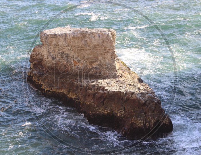 A Massive outcrop rock in the sea