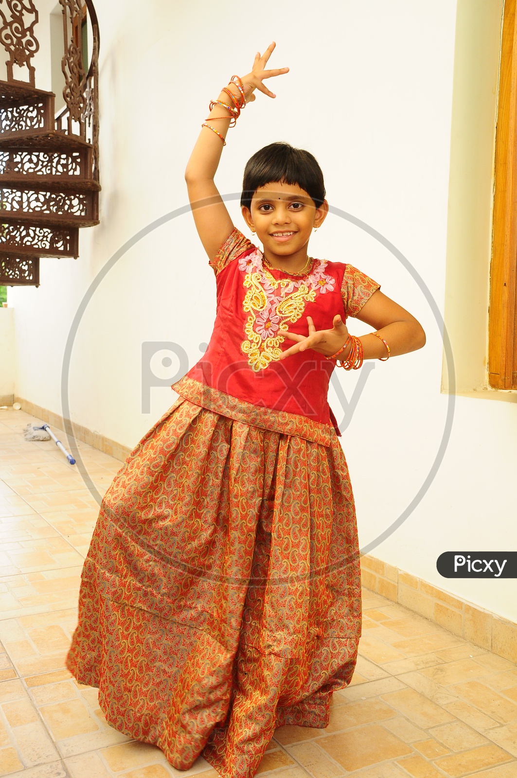 Indian Little girl dancing in a traditional attire