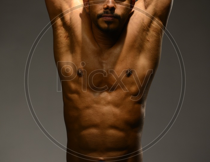 Indian Muscular man with six pack abs
