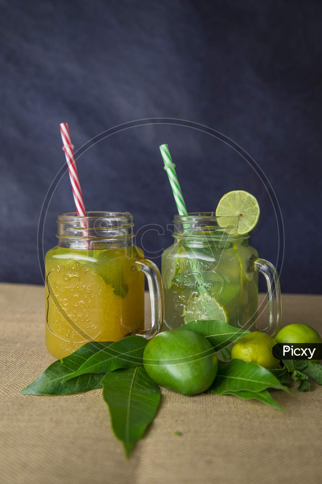 Kairi panha or Raw mango drink and lemon juice is a traditional indian summer beverage served in glass