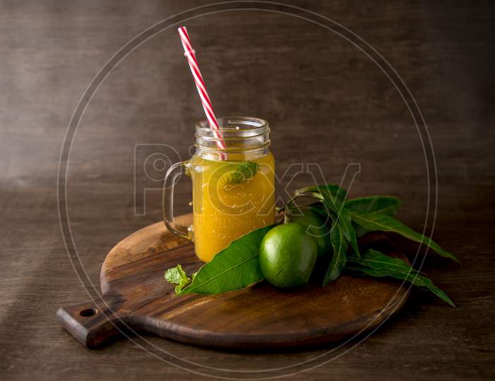 Kairi panha or Raw mango drink  is a traditional indian summer beverage served in glass