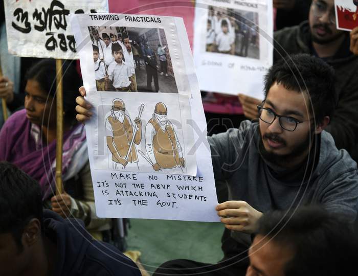 Students And People From Various Walk Of Life Stage A Protest Condemning Sundays Attack At Delhis Jawaharlal Nehru University (Jnu), In Guwahati