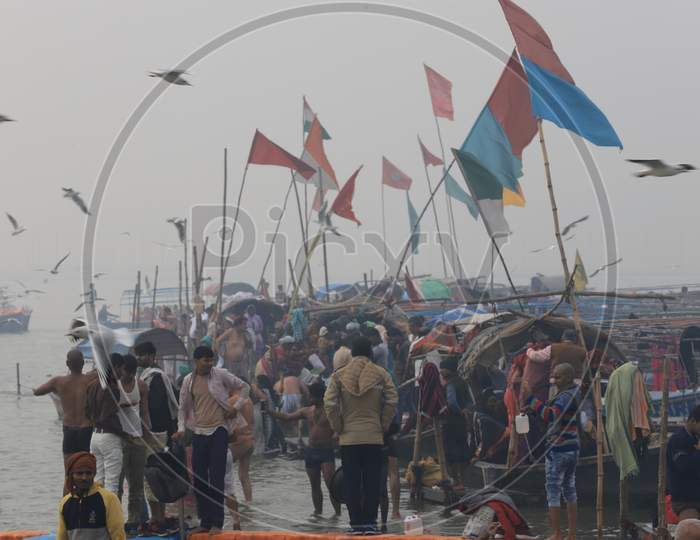 Crowd Of Hindu Devotees Taking Holi Dip In River Triveni Sangam At Prayagraj During  Ardh Kumbh Mela 2019