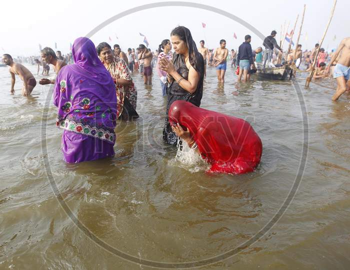 Hindu Devotees  Taking Holy Bath  in Triveni Sangam River bank At  Prayagraj During Ardh Kumbh Mela 2019