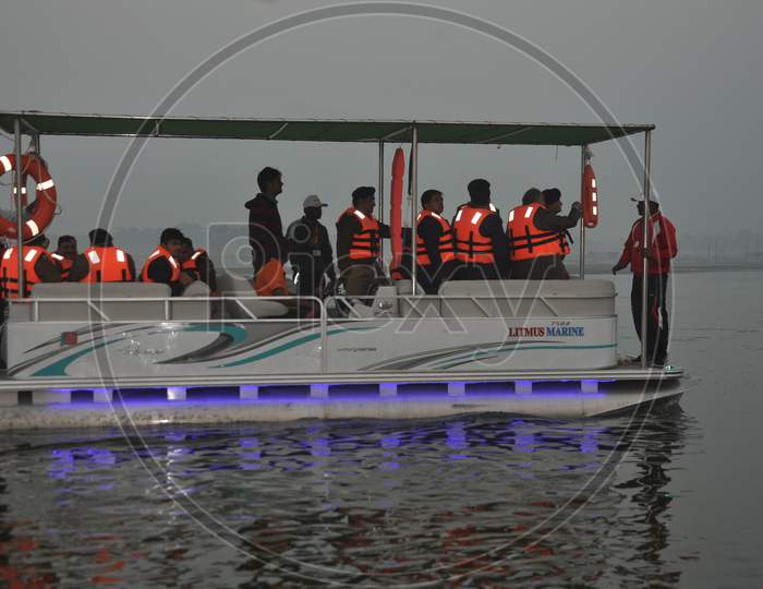 Tourists Enjoying Boat Rides in Triveni Sangam River at Prayagraj , Allahabad
