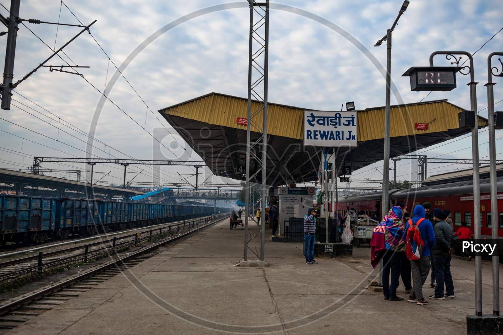 Rewari Jn. Railway Station With Passengers on Platforms