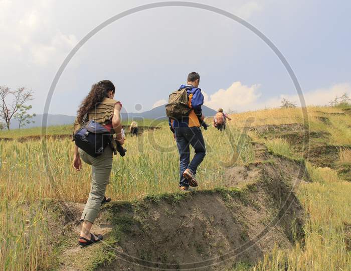 Tourists hiking the grasslands