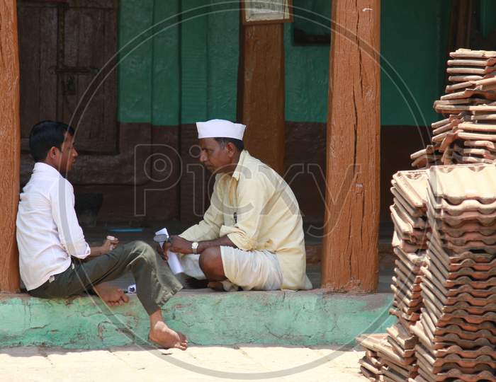 Two Indian men having conversation