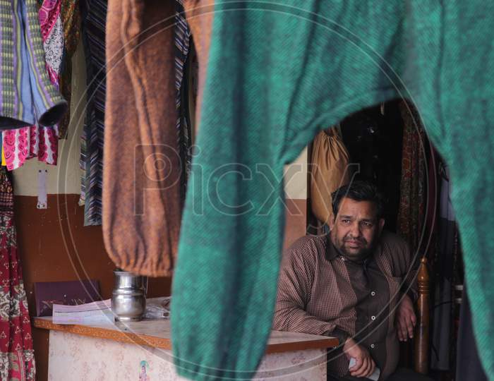 Portrait of Rajasthani Man outside his shop