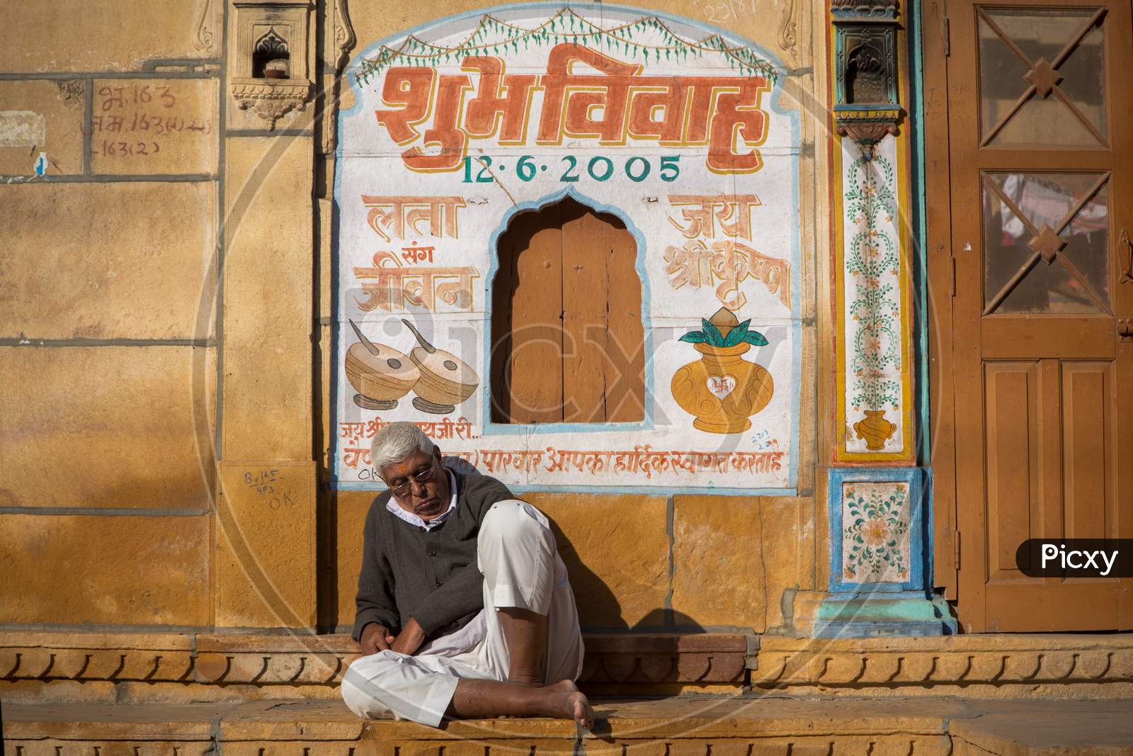 Indian Man sitting on the floor