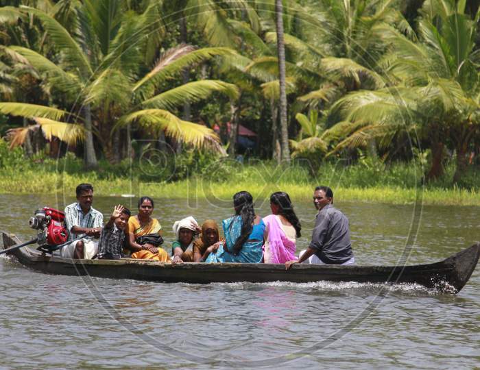 Tourists moving on the boat in Backwaters of Kerela
