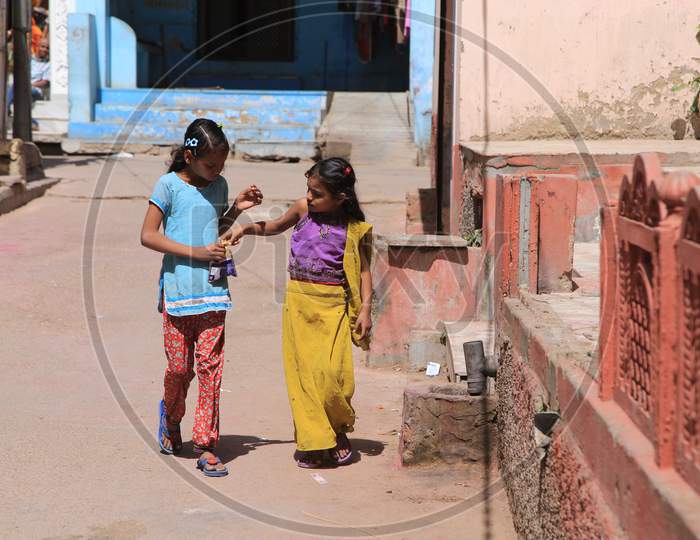 Children walking on the streets, Pushkar