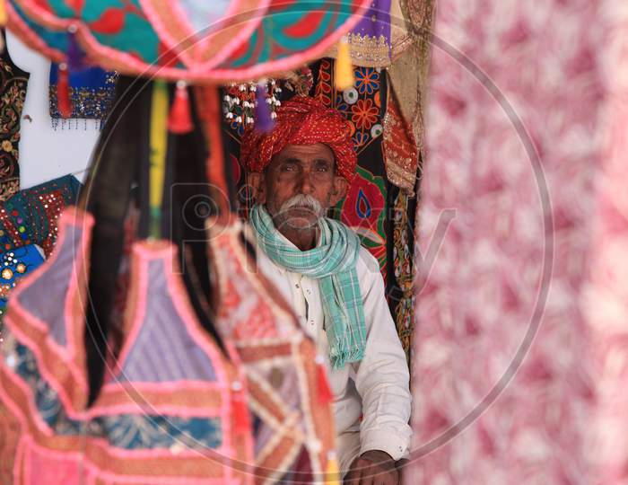 Portrait of Rajasthani Old Man in a Shop