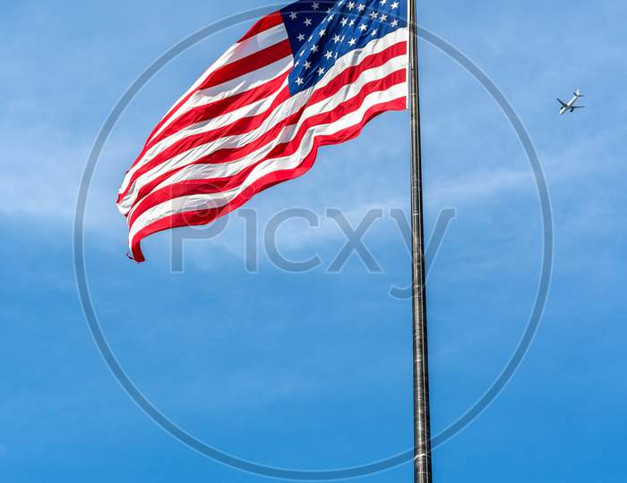 American Flag On Liberty Island In New York City