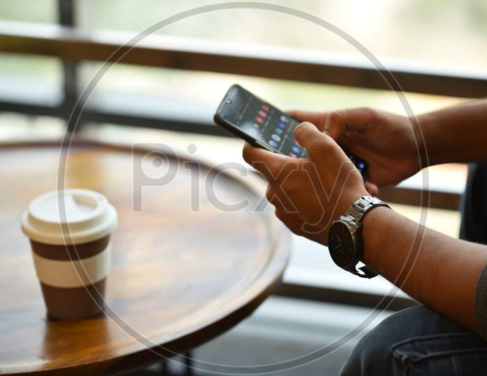 a man using a mobile phone