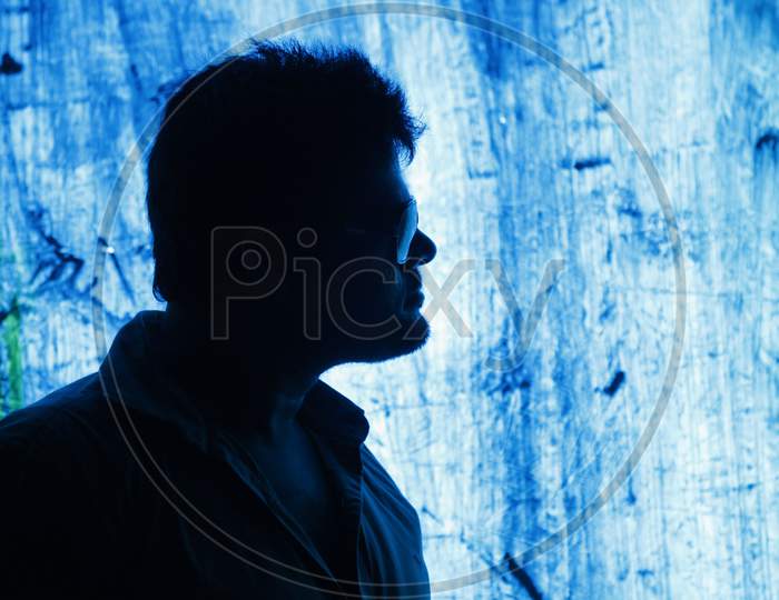 Low Light Photography of a man standing