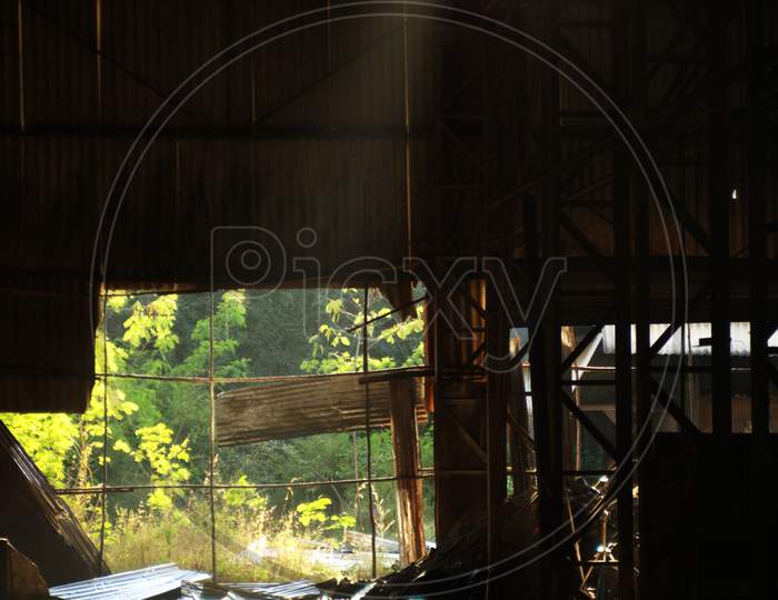 Light passing through the Entrance of an Iron shed