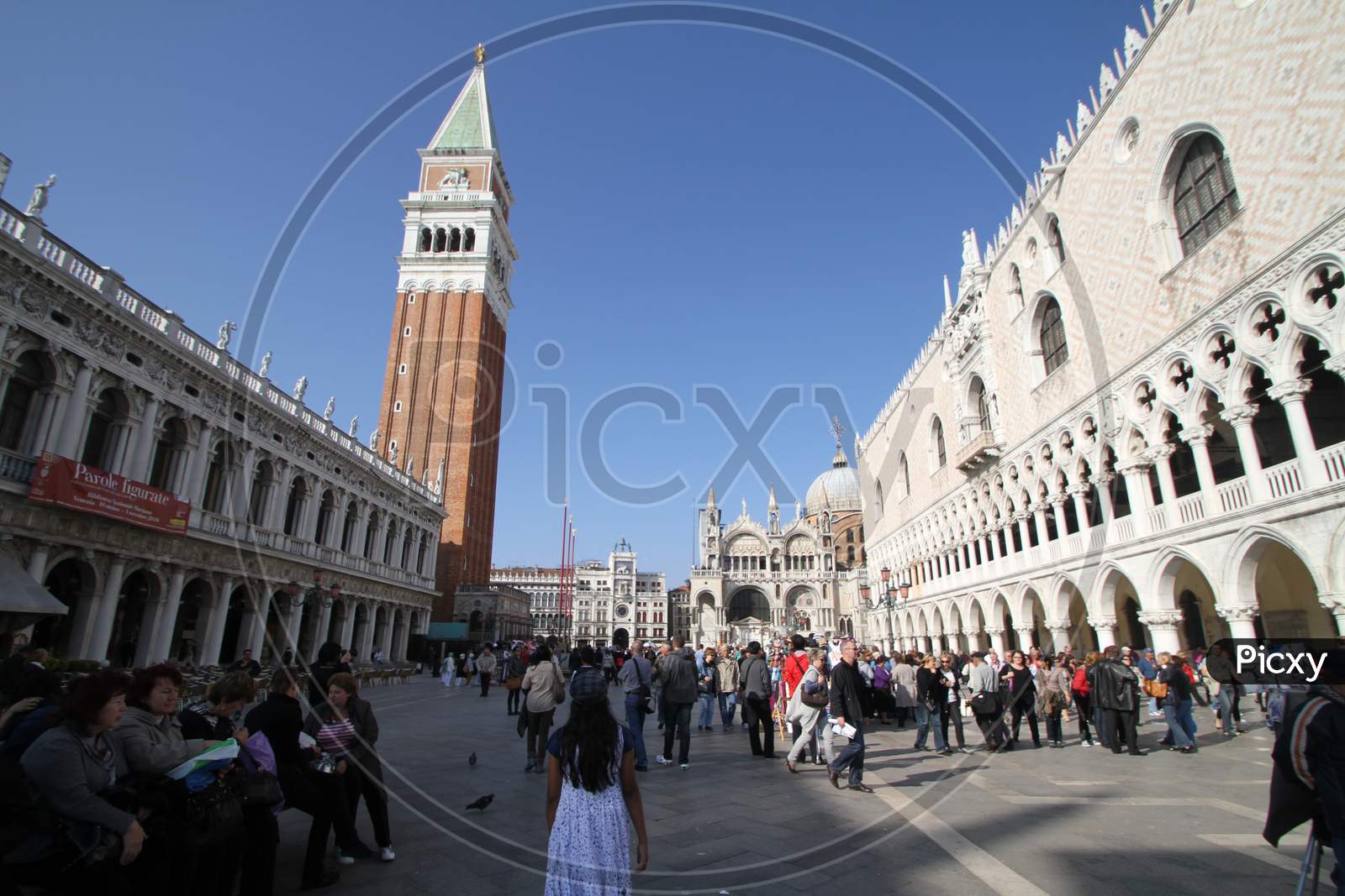 Crowd walking past the St. Mark's Square