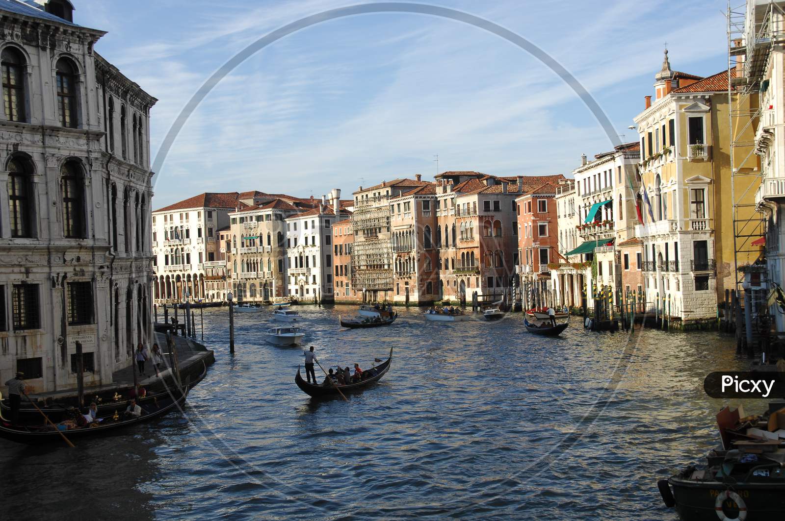 Gondola boats moving on the Grand canal