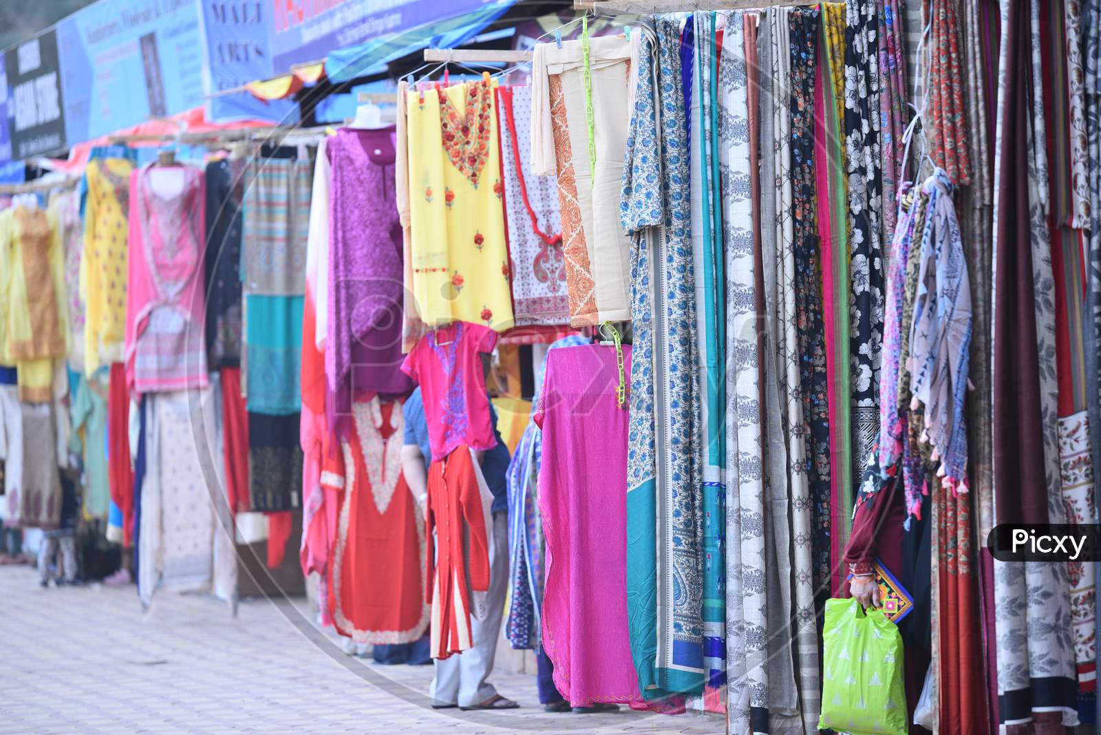 People shopping in Kashmiri Shawls  and dresses Stalls at NUMAISH,Nampally
