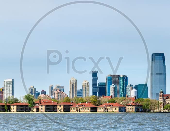 Ellis Island And Skyscrapers Of Jersey City, Usa
