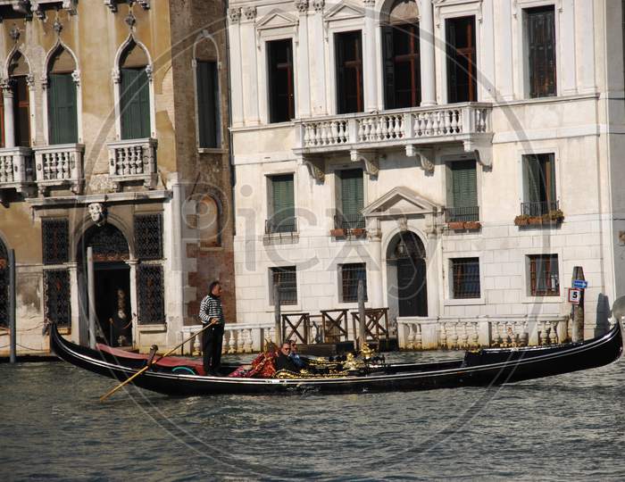 A Venice man riding Gondola