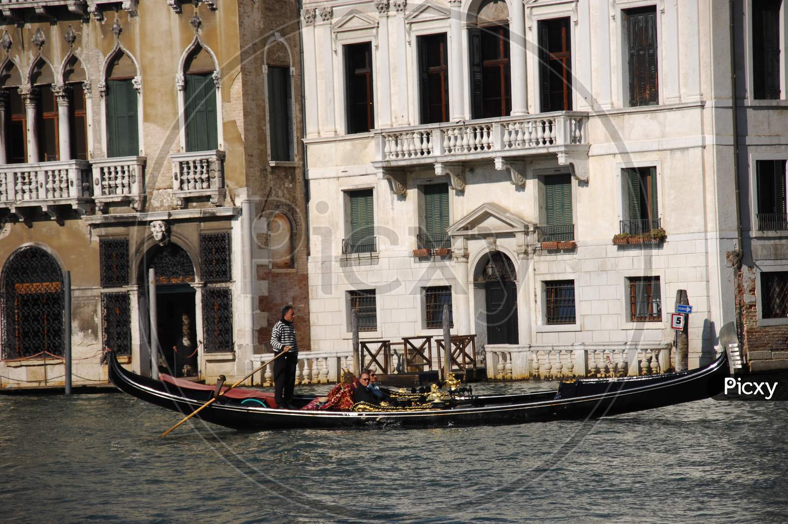 A Venice man riding Gondola