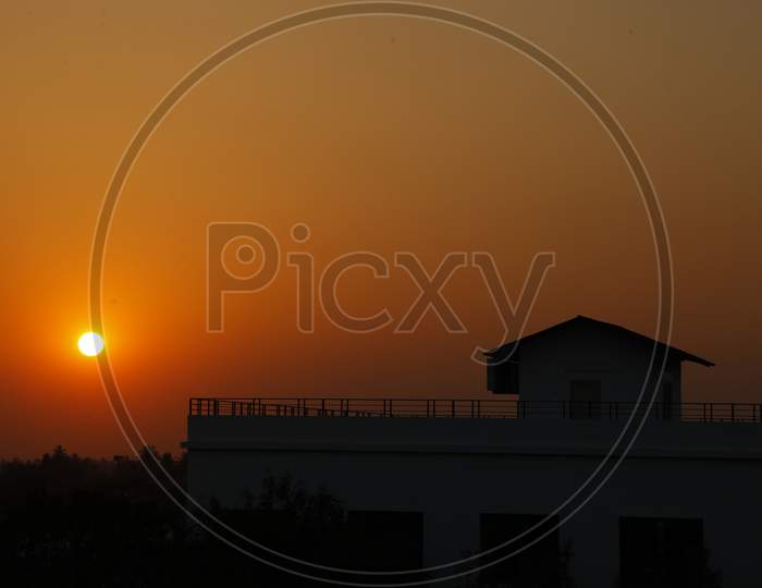 View of sunset by the modern house