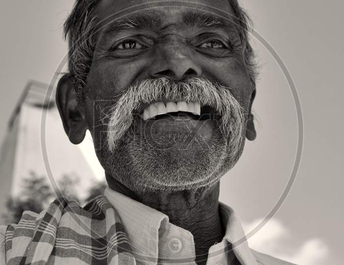 An Indian Rural Village Man With  a Smile  Face