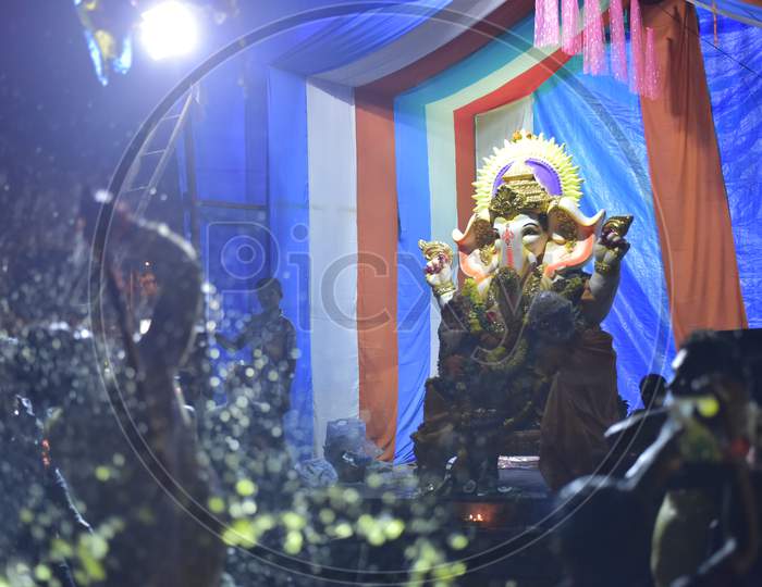 People dance and celebrate before Ganesh nimarjanam, Kphb 2017