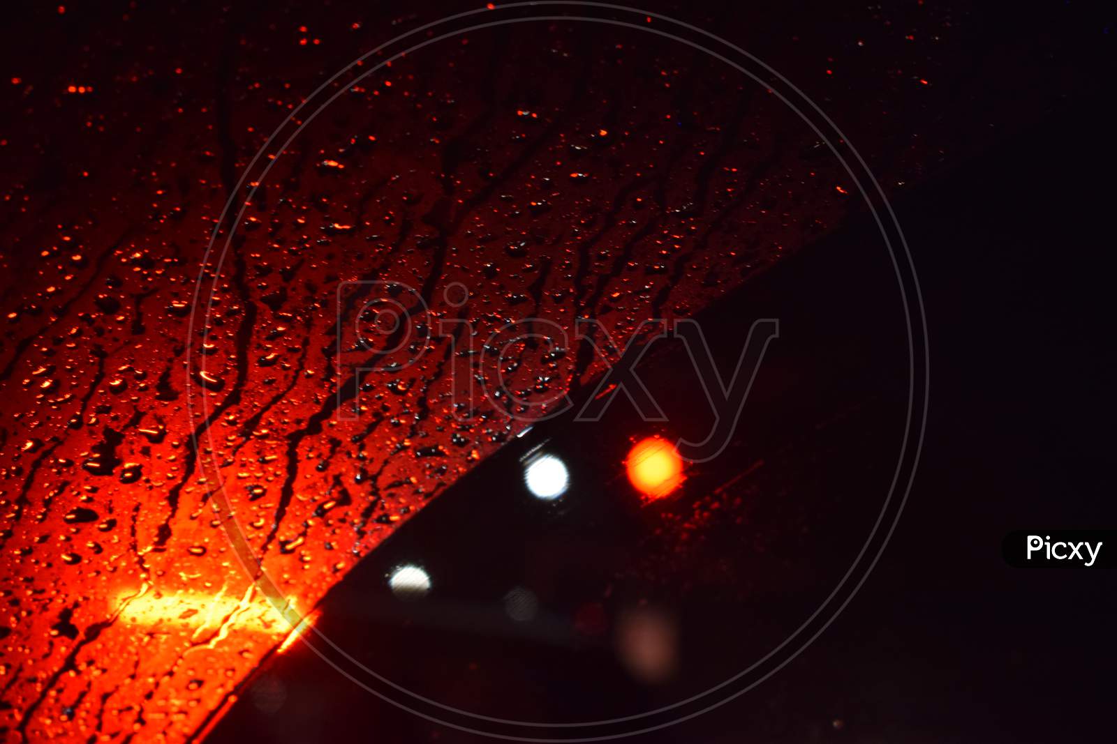 Water Droplets On Car Glass Shield