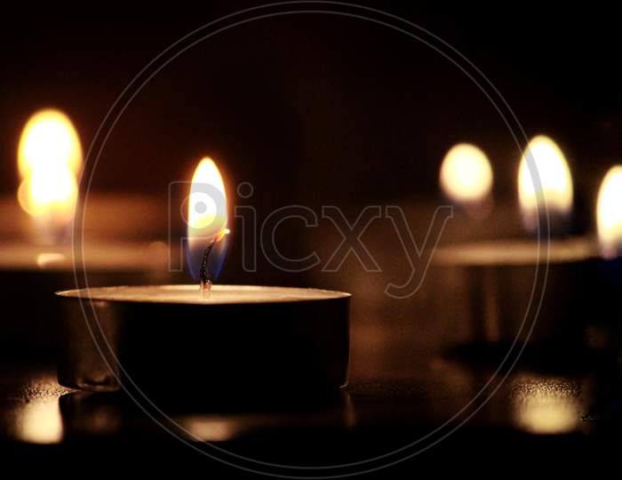 Diwali Dias Lighted Over Dark Background