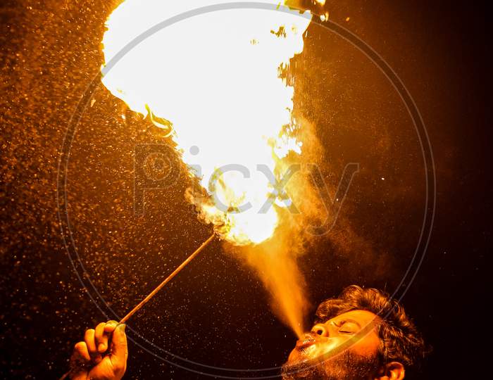 Person blowing fire it's a spiritual act