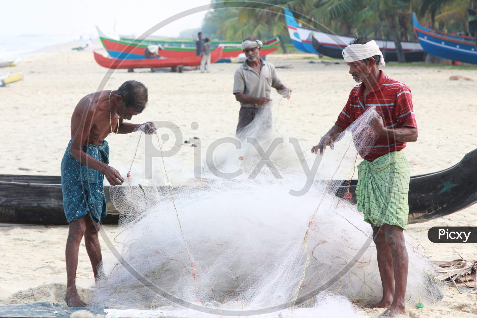 Indian Fishermen at Marari Beach, Kerala