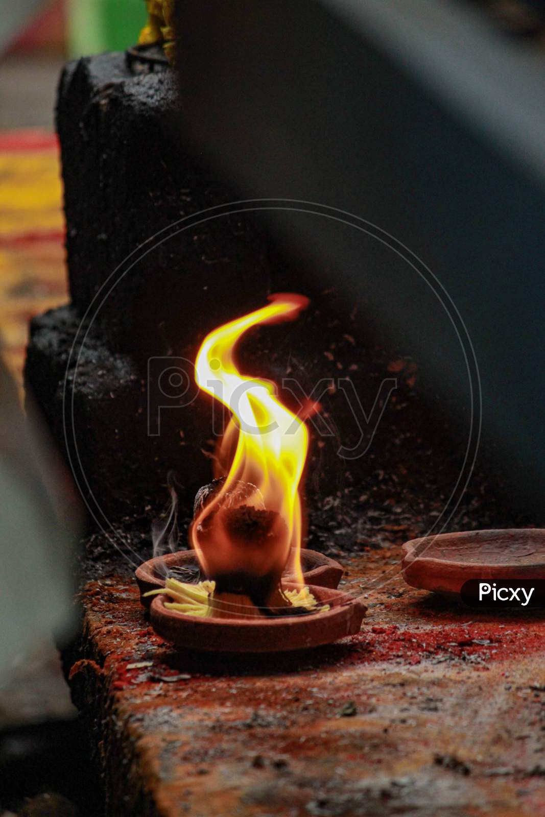 Ghee Dipped Dias In Clay Plates Lighted  During Karthika Masam At Hindu Temples