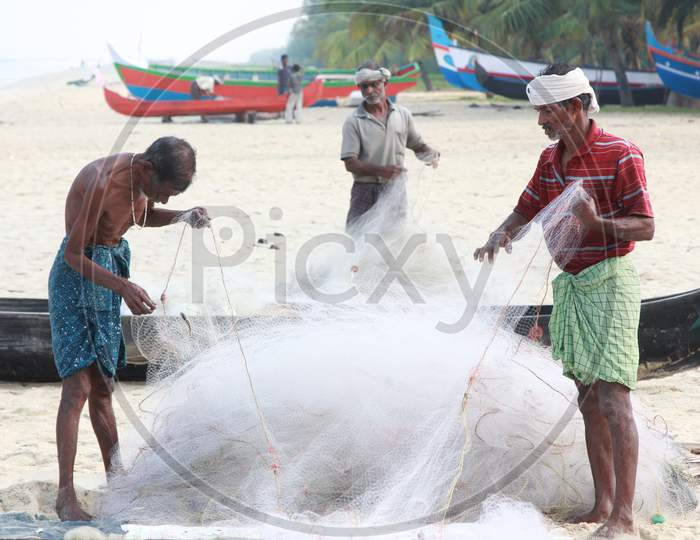 Indian Fishermen at Marari Beach, Kerala