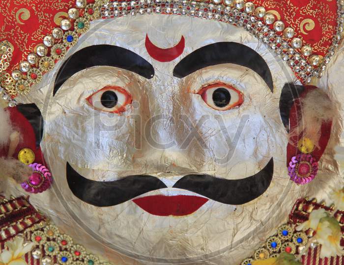 A Mask with Hindu God Face