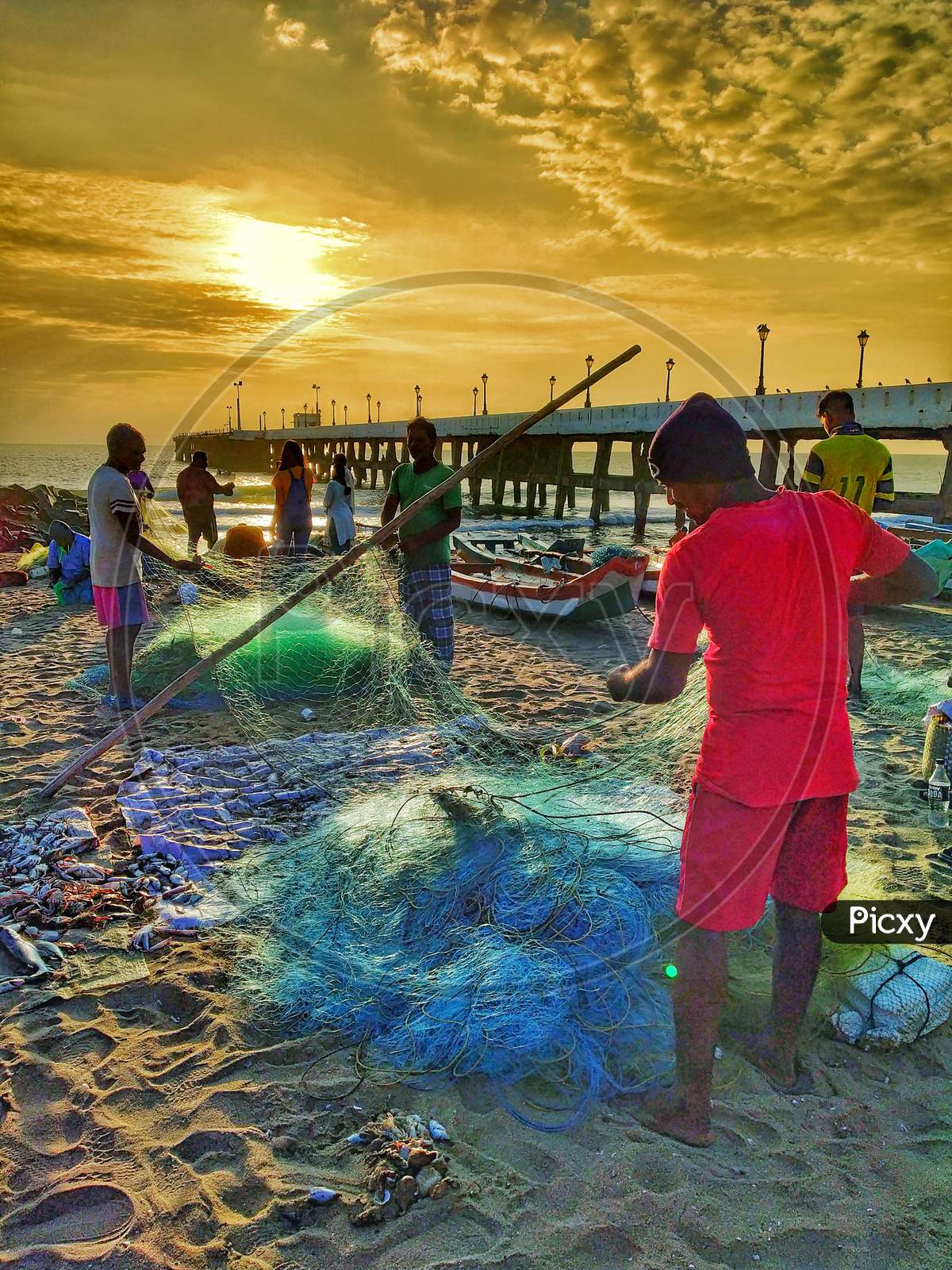 Fisherman In an Beach With Fishing Nets