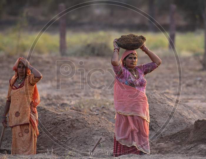 Portrait of Rajasthani Woman working