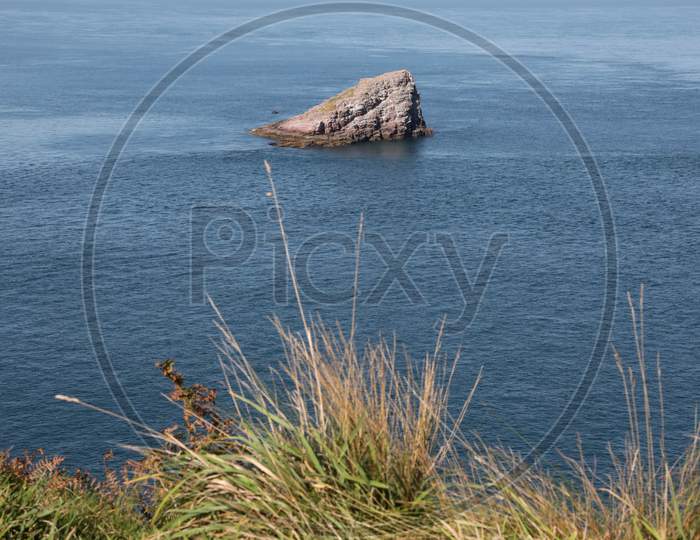 Landscape of Outcrop in the middle of sea