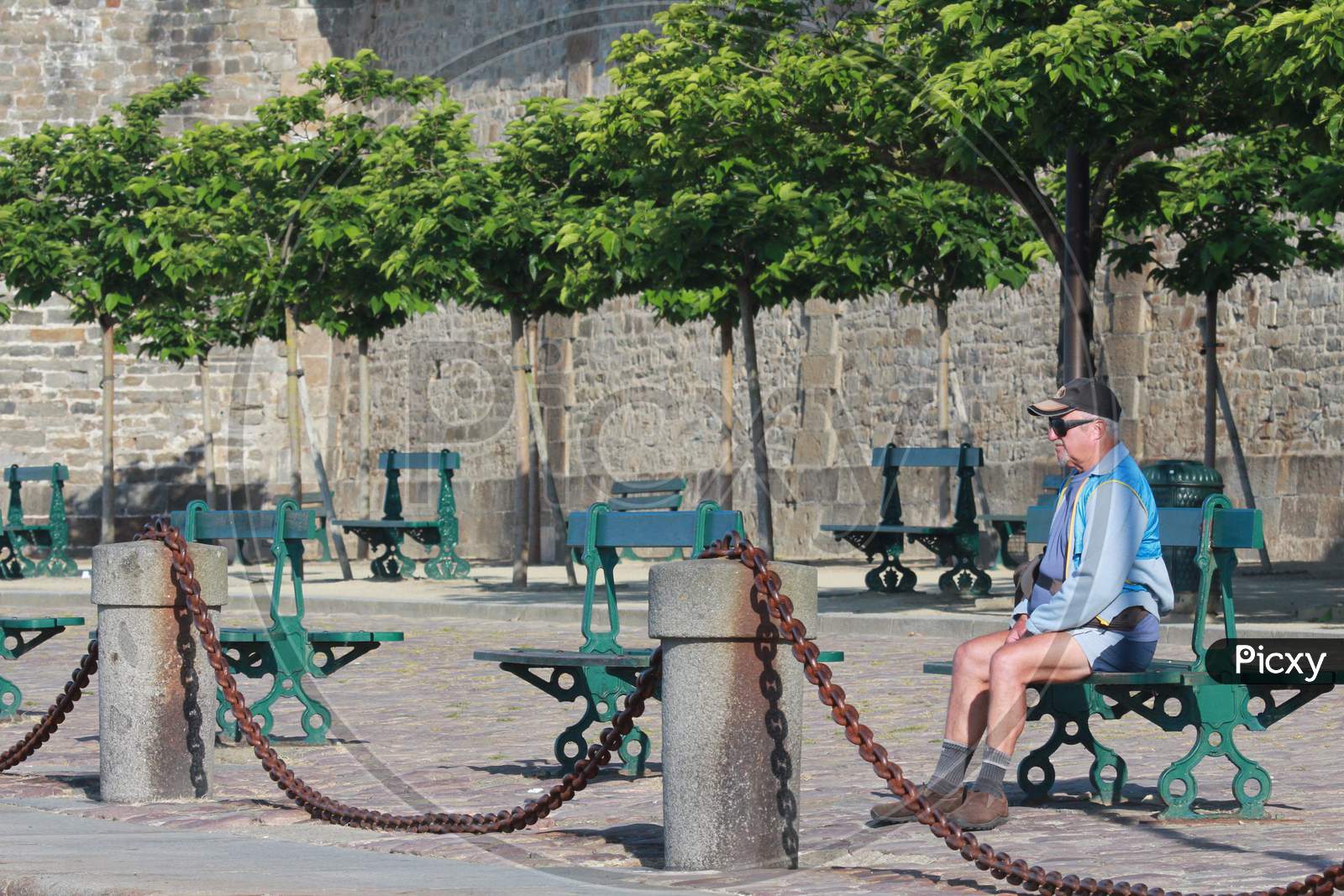 A Man sitting on the bench